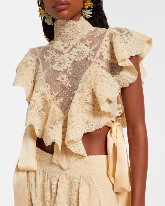       Блузка из кружева с лентами